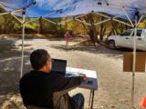 click to enlarge - photo by: Brandon Moore - Each of the 13 aid stations have HAM radio operators on site who keep track of the runners coming in and out. They then send the digital data to the data team who publishes it into the adilas.biz site for the world to see, watch, and follow their runners.