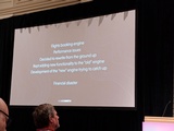 click to enlarge - photo by: Brandon Moore - Slide from Guust Nieuwenhuis - Modernizing through evolution not revolution. This slide showed some problems with a full rewrite that went bad. They kept adding to the old engine and the new engine kept having to play catch-up. It ended in disaster.