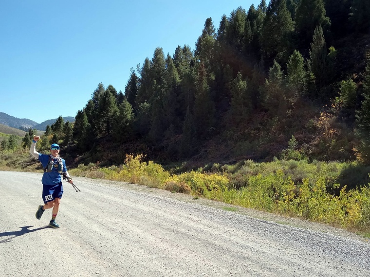 click to enlarge - photo by: Brandon Moore - Going for it! Happy around mile 45 ish!