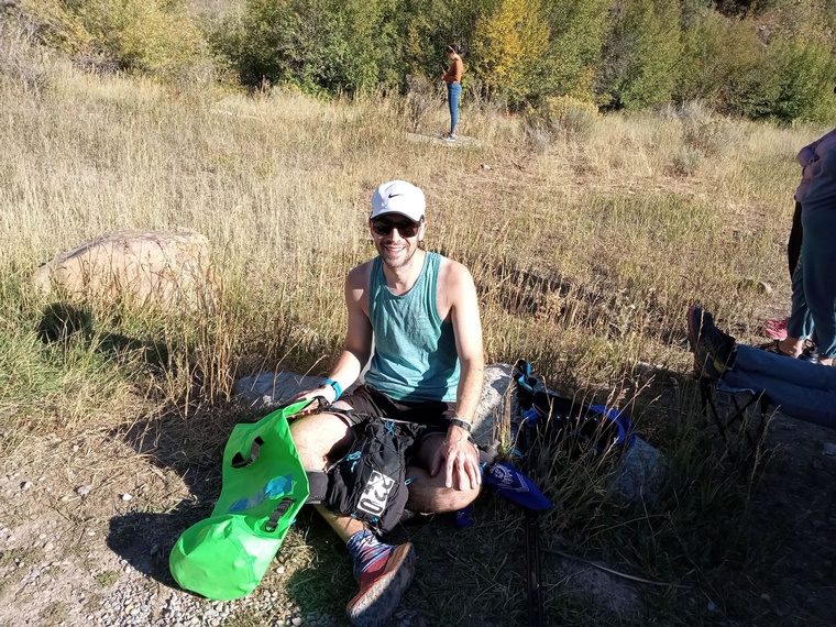 click to enlarge - photo by: Brandon Moore - Swapping out gear at the aid station - Temple Fork around mile 45 ish.