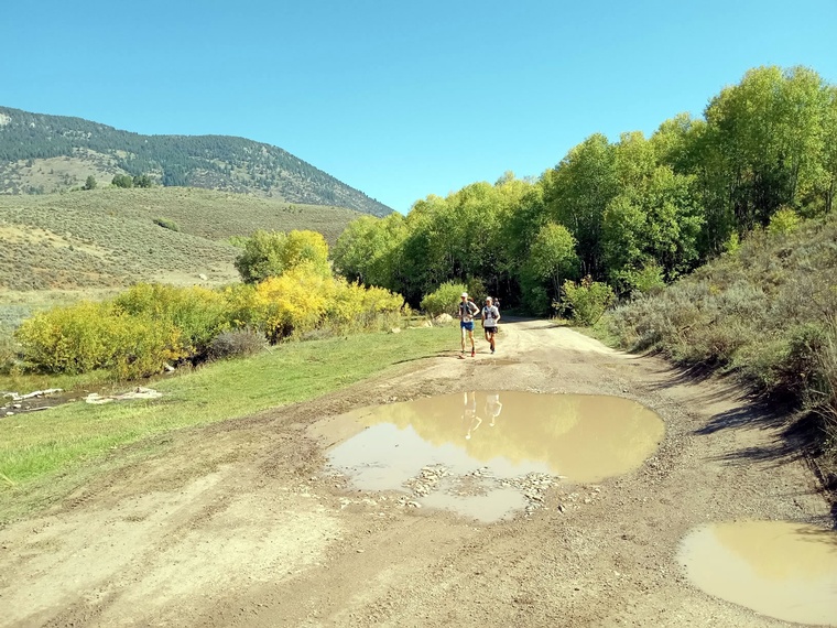 click to enlarge - photo by: Brandon Moore - Dodging mud puddles - part of mountain trails and roads.