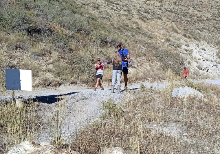 click to enlarge - photo by: Brandon Moore - Coming into Temple Fork aid station and into the arms of a little one!